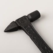 Black iron "hammer" bottle opener